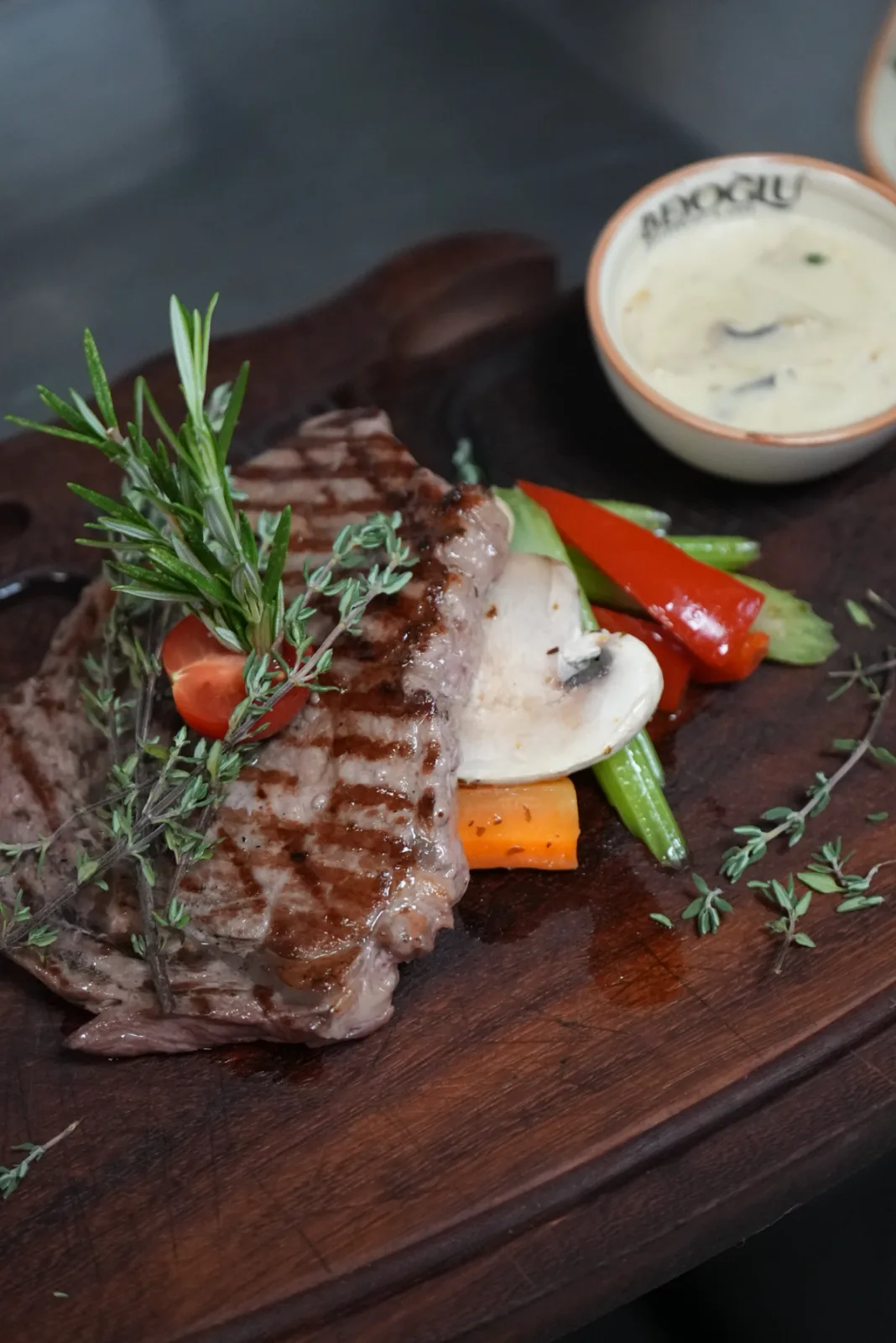 Grilled steak on a wooden board